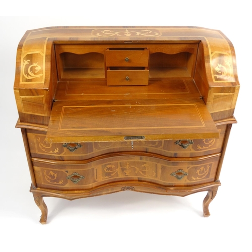 7 - Sorrento style serpentine fronted bureau fitted with a fall above two drawers, 86cm high x 83cm wide... 
