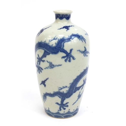 2223 - Chinese blue and white porcelain vase, decorated with dragons chasing a pearl, character marks to th... 