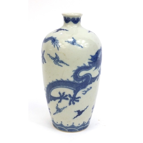 2223 - Chinese blue and white porcelain vase, decorated with dragons chasing a pearl, character marks to th... 