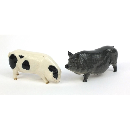 2119 - Two Royal Doulton model pigs, both with factory marks to the base, the tallest 7cm high