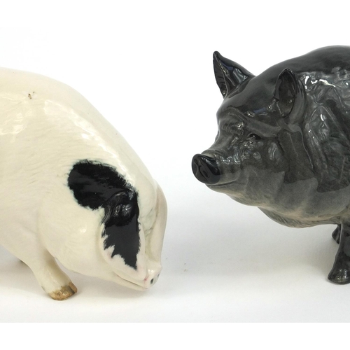 2119 - Two Royal Doulton model pigs, both with factory marks to the base, the tallest 7cm high