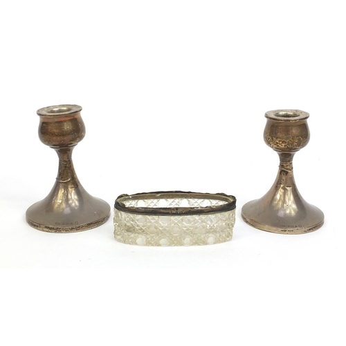 2425 - Pair of silver dwarf candlesticks, together with a cut glass pot with silver rim, hallmarked Birming... 