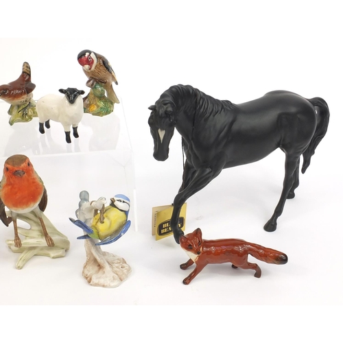 2120 - Group of collectable china animals including a Beswick Black Beauty Horse, three Beswick rams, Goebe... 