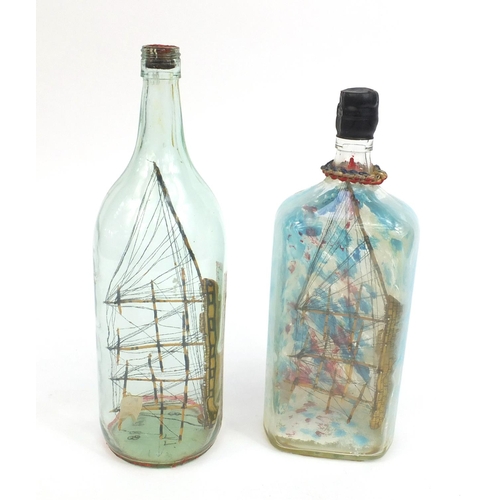 2167 - Two vintage ships in glass bottles, the longest 32cm long