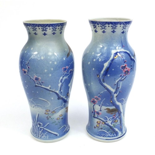 2207 - Pair of Japanese porcelain vases hand painted with birds amongst trees and foliage, character marks ... 