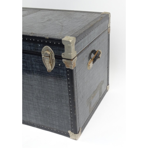 9 - Large metal bound travelling trunk, 58cm high x 102cm wide x 57cm deep