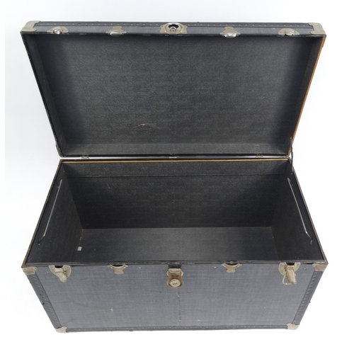 9 - Large metal bound travelling trunk, 58cm high x 102cm wide x 57cm deep
