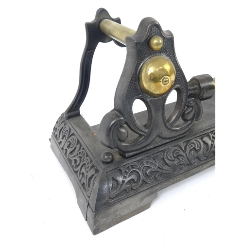 36 - Art Nouveau style cast iron and brass fender, 114cm long