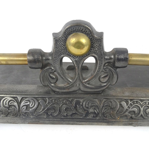 36 - Art Nouveau style cast iron and brass fender, 114cm long