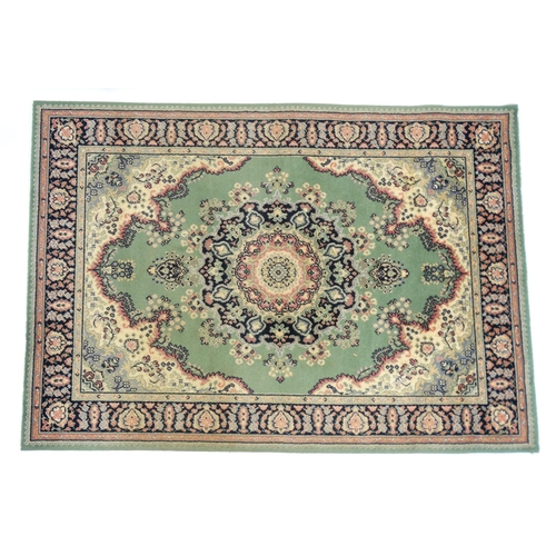 56 - Green ground floral rug, approximately 170cm x 120cm