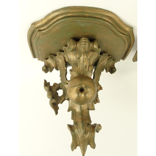 60 - Pair of painted pine carved wall brackets, 34cm high
