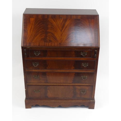 40 - Mahogany bureau fitted with a fall above four drawers, 100cm high x 74cm wide x 44cm deep