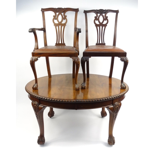 6 - Victorian mahogany wind out dining table with extra leaf, and six chairs including two carvers, all ... 