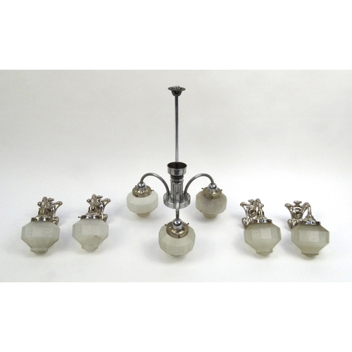 2064 - Retro chrome three branch light fitting with glass shades, together with four matching wall sconces,... 