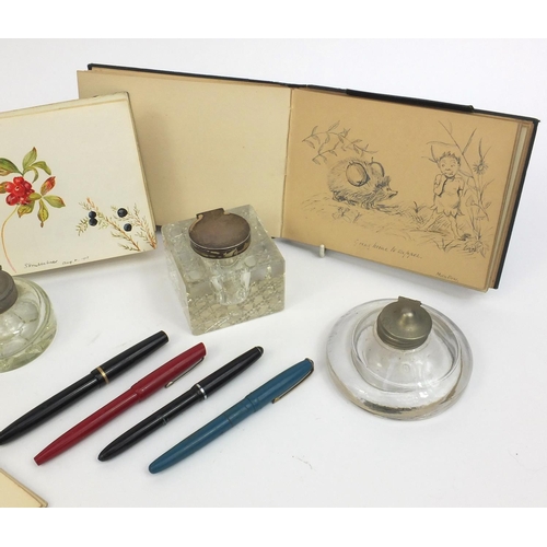 2350 - Group of objects including four fountain pens, three inkwells including a silver topped example and ... 