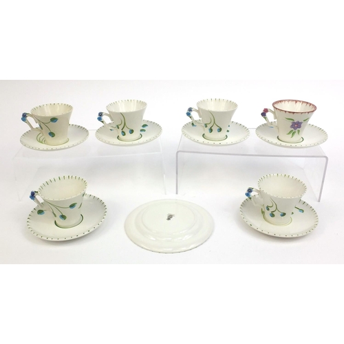 2269 - Group of James Kent cups and saucers with floral decoration including one trio, factory marks to the... 