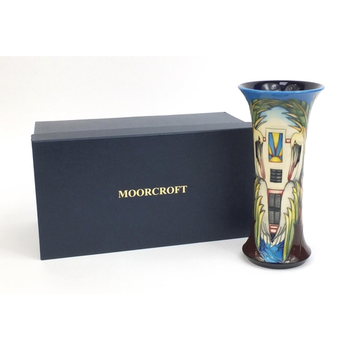 2104 - Boxed Moorcroft pottery limited edition vase designed by P.Gibson, tube lined with stylised pelicans... 