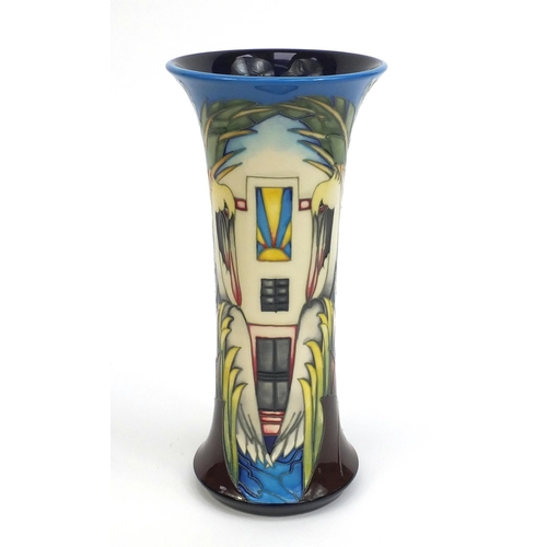 2104 - Boxed Moorcroft pottery limited edition vase designed by P.Gibson, tube lined with stylised pelicans... 