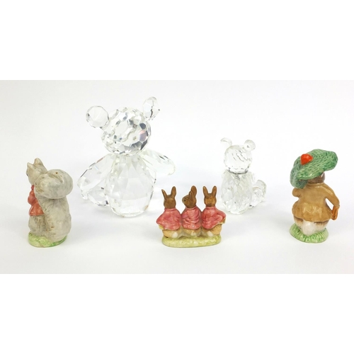 2141 - Two Royal Albert Beatrix Potter figures together with a Beswick example and two Swarovski crystal st... 