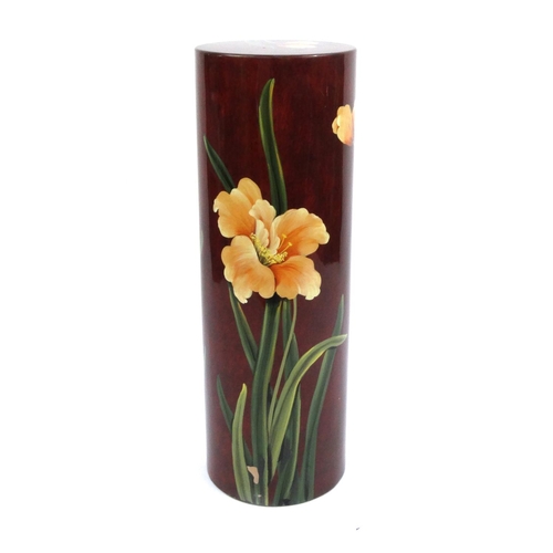 2057 - Oriental circular pedestal decorated with flowers onto a red ground, 92cm high