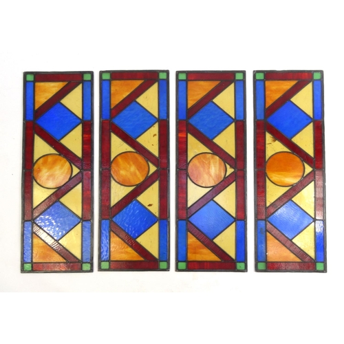 2089 - Four colourful leaded stained glass windows with geometric design, each 104cm high x 33cm wide