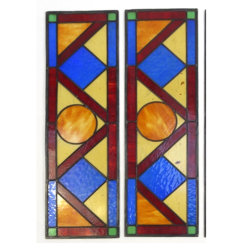 2089 - Four colourful leaded stained glass windows with geometric design, each 104cm high x 33cm wide