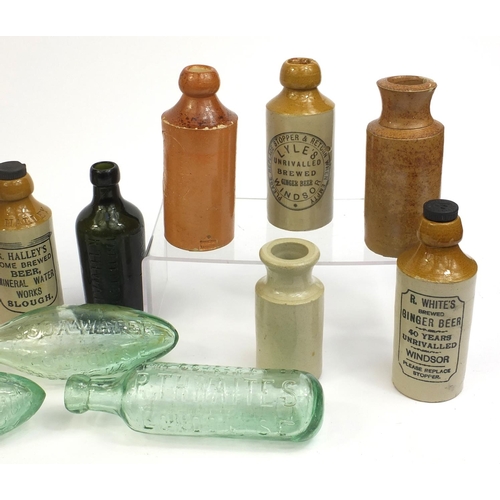 2241 - Collection of stoneware advertising bottles together with four glass examples including some Doulton... 