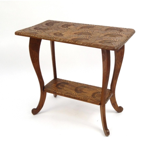 2043 - Fruitwood occasional table with under tier carved with sunflowers, 71cm high x 75cm wide x 43cm deep