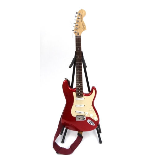 2074 - Squier for fender Stratocaster, serial No.CYO3074969 together with fitted carrying case