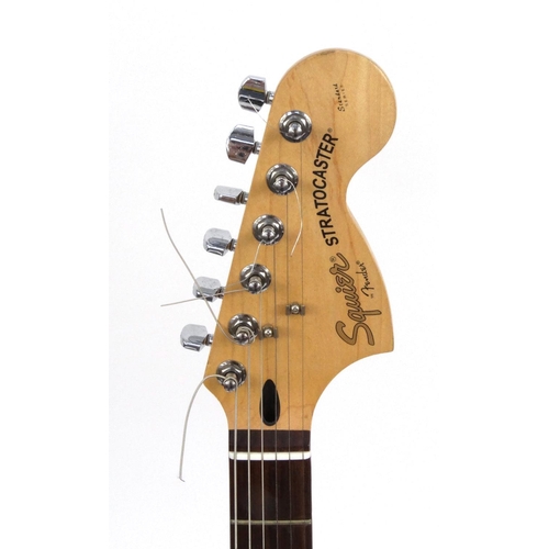 2074 - Squier for fender Stratocaster, serial No.CYO3074969 together with fitted carrying case