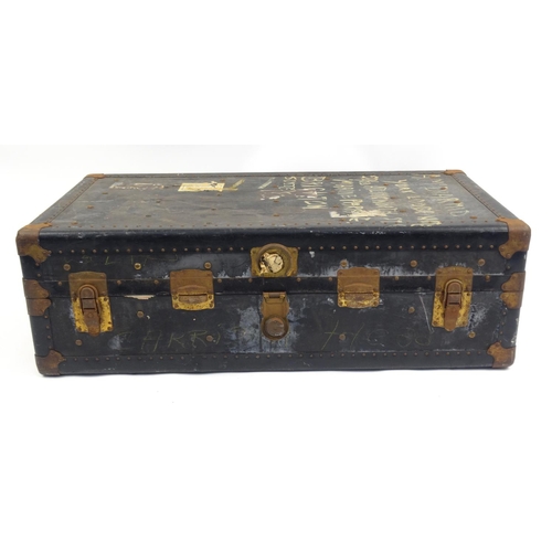 21 - Large metal bound travelling trunk, 32cm high x 100cm wide x 53cm deep
