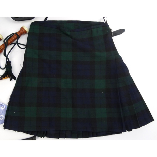 2078 - Cased set of bagpipes together with a kilt and tutor DVD, the kilt size 8