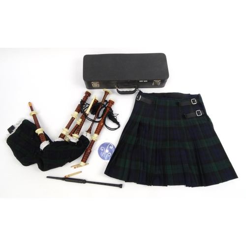 2078 - Cased set of bagpipes together with a kilt and tutor DVD, the kilt size 8