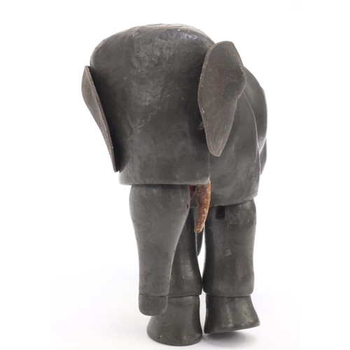 2291 - Antique articulate wooden elephant child's toy, 19cm high