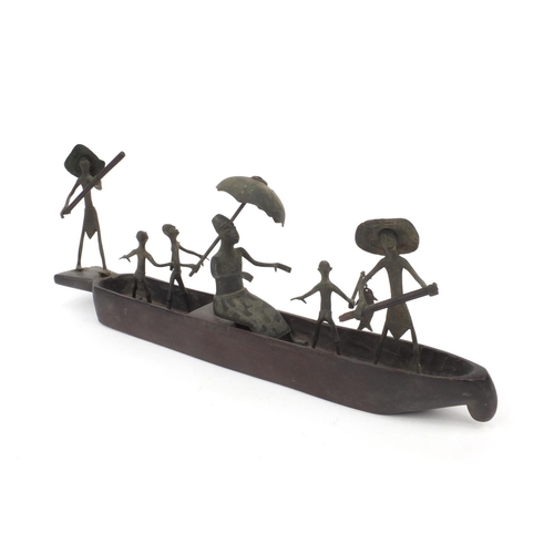 2305 - Middle Eastern Benin style wooden and bronze boat with figures, 47cm long