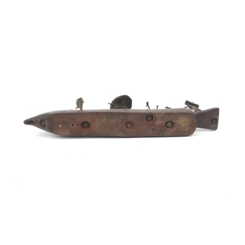 2305 - Middle Eastern Benin style wooden and bronze boat with figures, 47cm long