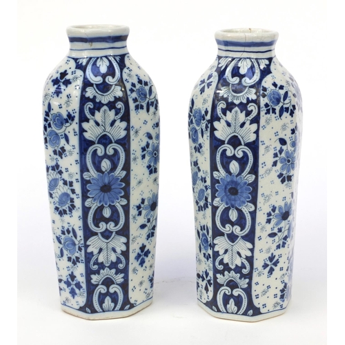 2308 - Pair of Dutch Delft hexagonal pottery vases hand painted with flowers, 26cm high