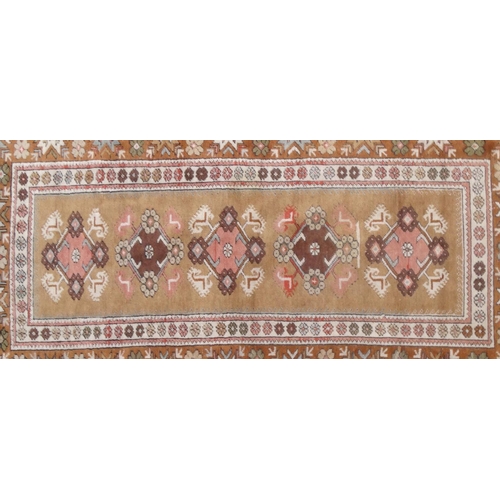 2056 - Rectangular Turkish rug with geometric border and central filled, 235cm x 131cm