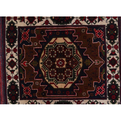 2055 - Group of Three rectangular Middle Eastern Afghan rugs, each with geometric design, each 160cm x 80cm