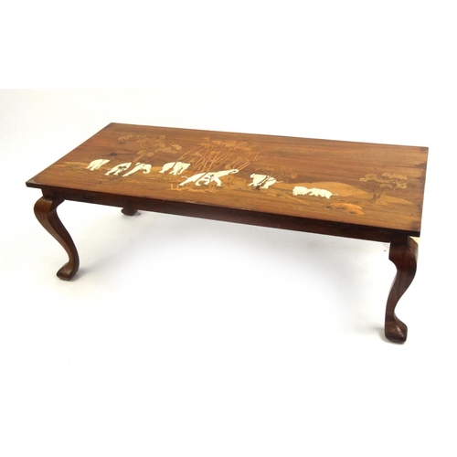 2030 - Hardwood coffee table inlaid with ivory decorated with elephants around an oasis with palm trees, 41... 