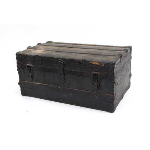 2062 - Vintage metal bound wooden travelling trunk, 34cm high x 71 cm wide x 44cm deep