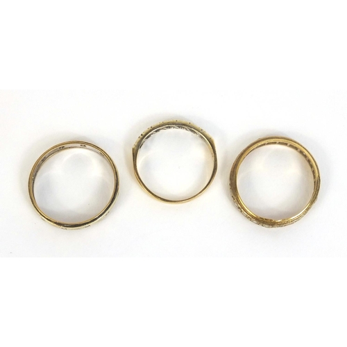 2462 - Two 9ct gold clear stone eternity rings and a 9ct gold half eternity ring, approximate weight 6.9g