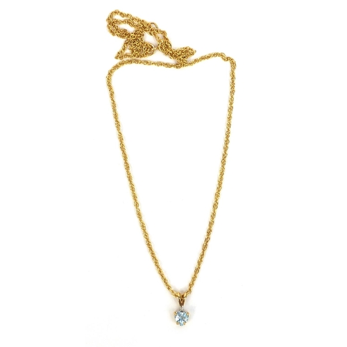 2466 - Blue stone love heart pendant on a 9ct gold necklace, approximate weight 2.7g