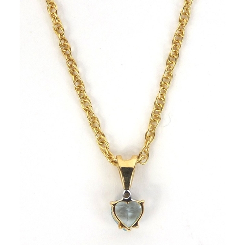 2466 - Blue stone love heart pendant on a 9ct gold necklace, approximate weight 2.7g