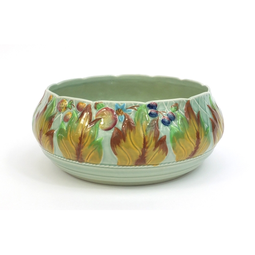 2130 - Clarice Cliff Newport pottery bowl hand painted with fruit and leaves, factory marks to the base, 23... 