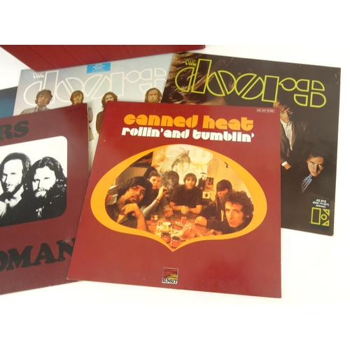 2084 - Case of LP records including The Doors, The Four Seasons, Johnny Rivers, Buckwheat etc