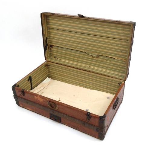 2063 - Vintage metal bound wooden travelling trunk, 31cm high x 83cm wide x 48cm deep