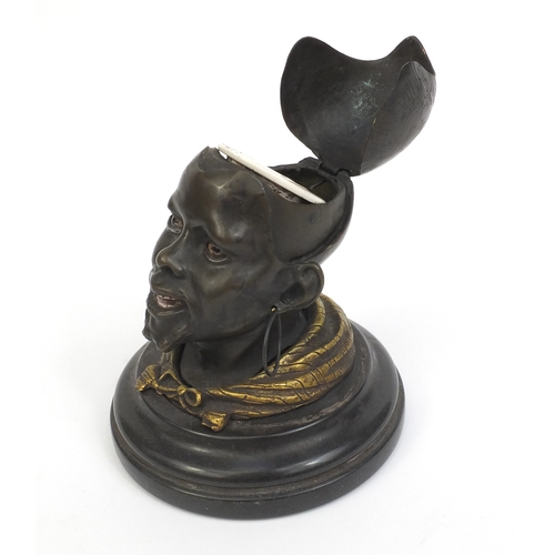 2349 - Goldscheider style Bronze inkwell in the form of males head, mounted on a marble base, 13.5cm high