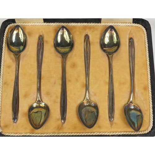 2423 - Cased set of six silver teaspoons, a pair of silver napkin rings and one other, various hallmarks