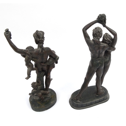 2158 - Two large decorative bronze style nude figures, the larger 61cm high